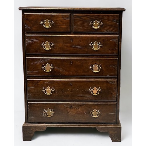 534 - A Bevan & Funnell 'Reprodux' TV cabinet modelled as an 18th century chest of drawers with brass bats... 