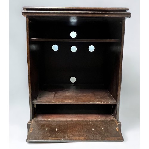 534 - A Bevan & Funnell 'Reprodux' TV cabinet modelled as an 18th century chest of drawers with brass bats... 