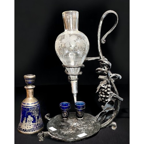 20 - A vintage Italian wine aerator with 'fruiting vine' etched-glass decanter on wrought-iron stand, tog... 