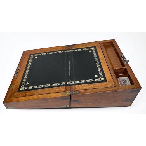 291 - A 19th century brass-bound walnut writing slop, a parquetry and walnut ladies sewing box and mahogan... 