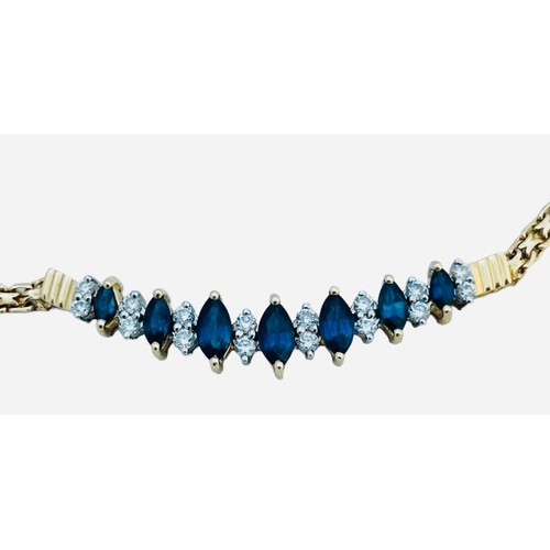 202 - A 14ct yellow gold necklace, set with seven marquise cut sapphires, and small round diamonds, estima... 