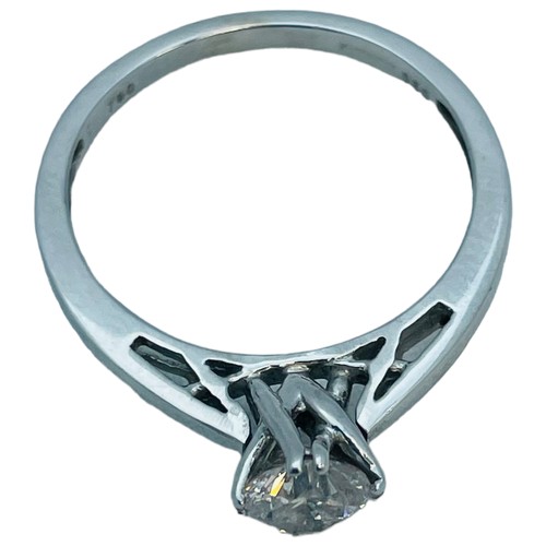 205 - An 18ct white gold solitaire diamond ring, claw set with a round brilliant cut diamond, H colour, VS... 