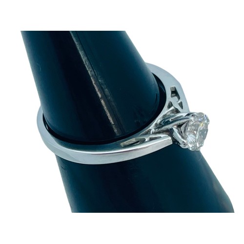 205 - An 18ct white gold solitaire diamond ring, claw set with a round brilliant cut diamond, H colour, VS... 