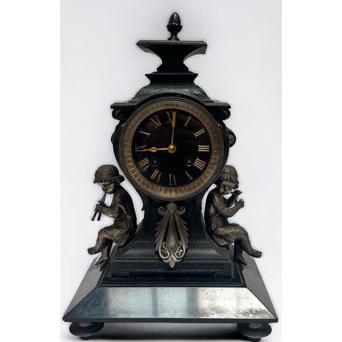 397 - A 19th Century cast metal and black slate mantel clock of inverted square baluster form, the eight-d... 