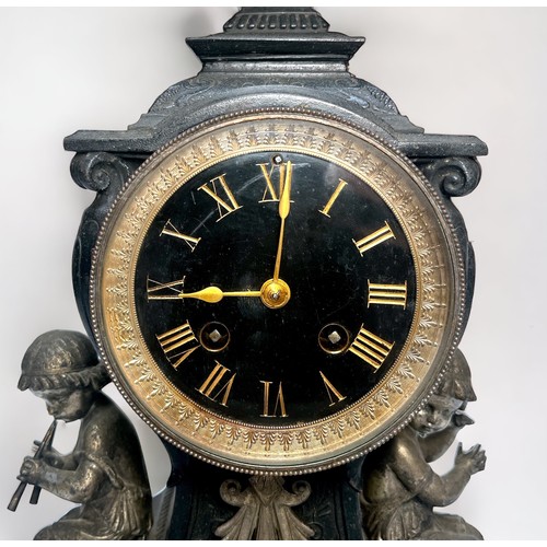 397 - A 19th Century cast metal and black slate mantel clock of inverted square baluster form, the eight-d... 