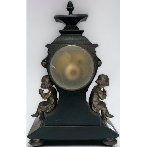 397 - A 19th Century cast metal and black slate mantel clock of inverted square baluster form, the eight-d... 