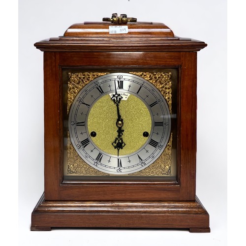 398 - A 'Thwaites & Reed' eight-day striking and chiming mantel clock, with later Tander DA-010 movement w... 