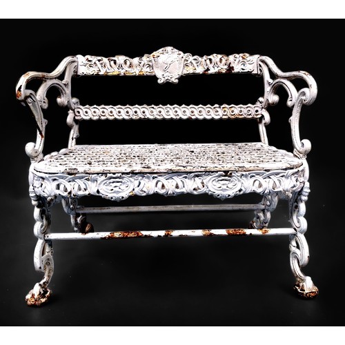 545 - A Victorian Coalbrookdale 'Style' cast iron garden bench, with Rococo scrollwork ends, scrolling fol... 