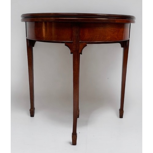 542 - An Edwardian mahogany dem-lune folding card table, with green baize playing surface, and rear slidin... 