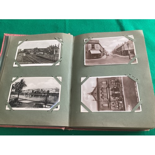 267 - An old postcard album in good condition containing approximately 290 standard size postcards. There ... 