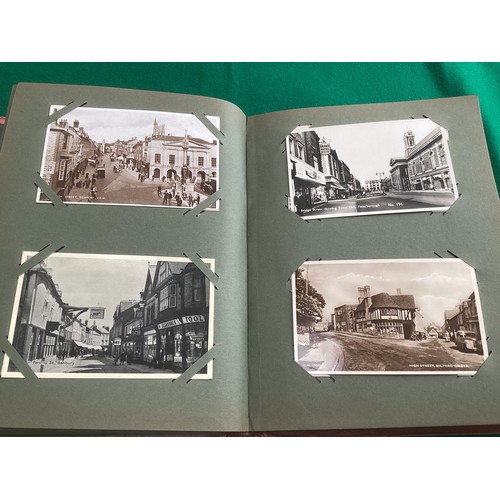 267 - An old postcard album in good condition containing approximately 290 standard size postcards. There ... 