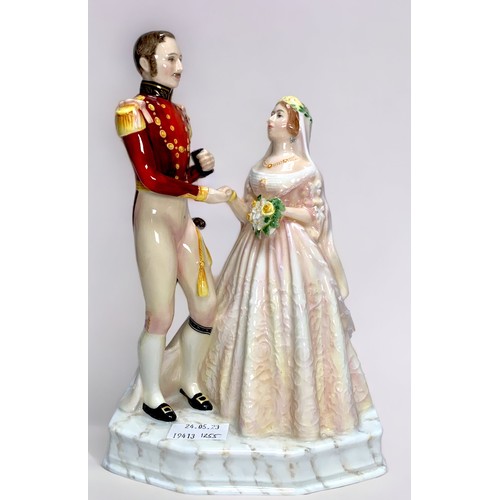 22 - A Royal Doulton Queen Vitoria & Prince Albert figural group, HN 3256, modelled by Douglas V. Tootle,... 