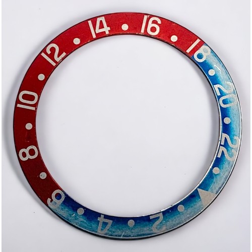 118 - A vintage Rolex blue and red ‘Pepsi’ bezel insert, with natural ‘ghost’ patina, 37mm diameter