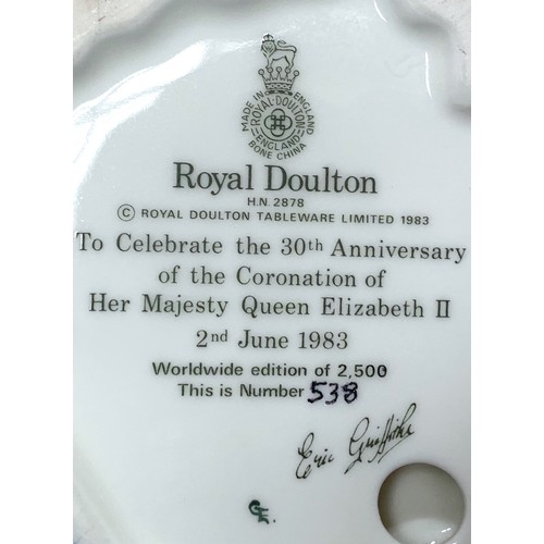 29 - Three Royal Doulton figures, to include, Queen Elizabeth II, to celebrate the 30th anniversary of th... 