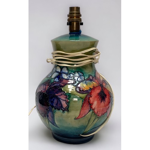 34 - A Moorcroft pottery 'Orchids pattern' baluster table lamp, 27cm high