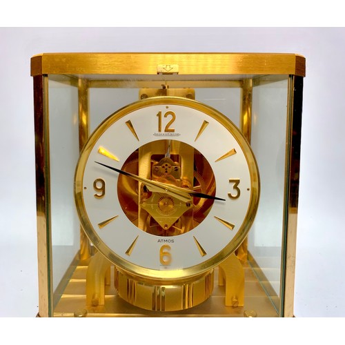 399 - A Jaeger Le Coutre Atmos Clock, model VIII R, with white enamel dial with Arabic numerals at the qua... 