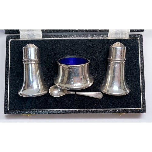 77 - A boxed silver three-piece cruet set by Sanders & Mackenzie, hallmarked Birmingham, 1965, gross weig... 