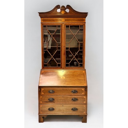 539 - An Edwardian mahogany and satinwood cross-banded bureau bookcase in the Sheraton Revival style, with... 