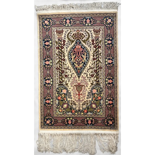 406 - A hand-knotted Persian silk prayer rug, finely worked in multi-coloured silk with Mihrab and central... 