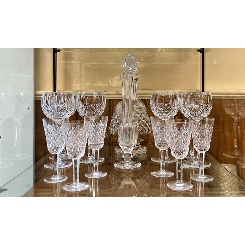 35 - A collection of Waterford Crystal in various cut patterms, comprising six large wine goblets, six sh... 