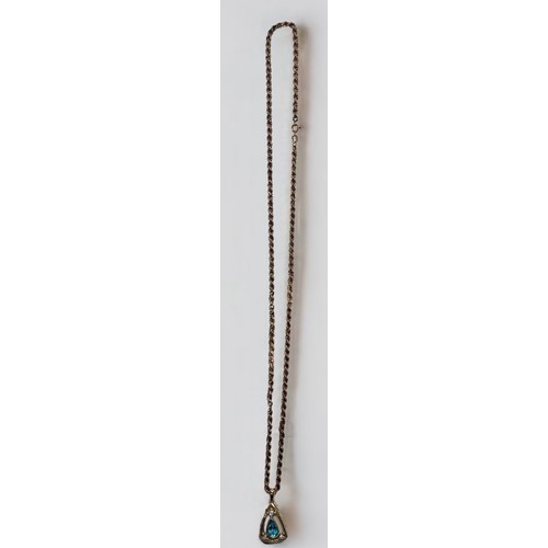 222 - A 9ct gold rope twist chain with pierced pendant set with a faceted pear shaped aquamarine and three... 