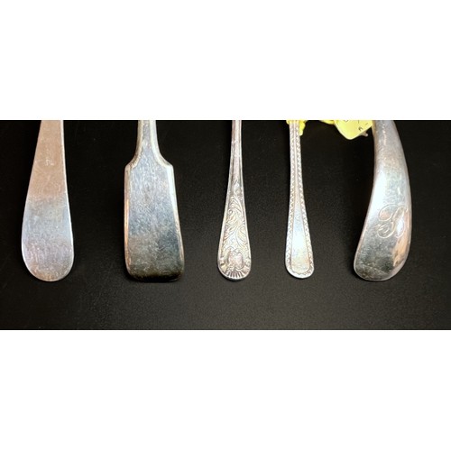 304 - Three various George III silver Old English pattern tablespoons and two coffee spoons, 6.77ozt, two ... 