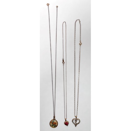 224 - Three various 9ct gold necklaces, two with heart shaped pendants, one set with diamonds, approximate... 