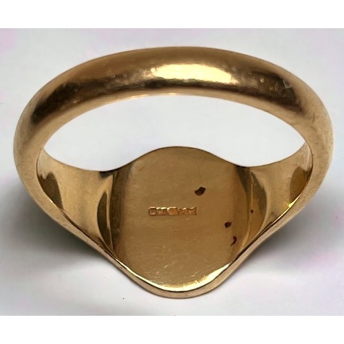 227 - A gents 9ct gold signet ring, gross weight approximately 8.4g