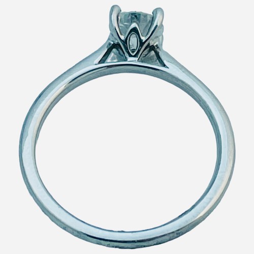 206 - A platinum solitaire diamond ring, claw set with a round brilliant cut diamond, I colour, P2 clarity... 