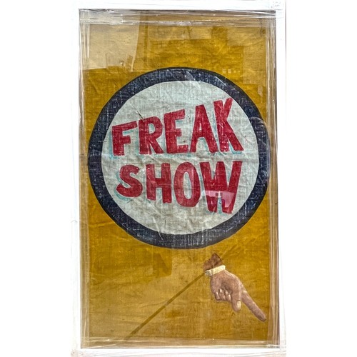 320 - A vintage hand-painted canvas carnival/circus sign reading ‘Freak Show’ with a hand pointing, glazed... 