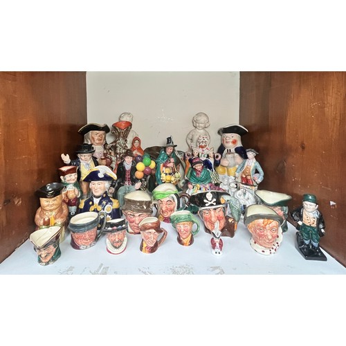 42 - A collection of assorted Royal Doulton, Staffordshire, etc. ceramics including, The Mask Seller, HN2... 