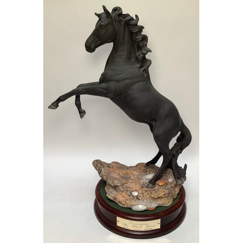 47 - A Beswick Ware ‘Cancara The Black Horse’ Beswick Centenary matt figure of a black horse rearing, mod... 