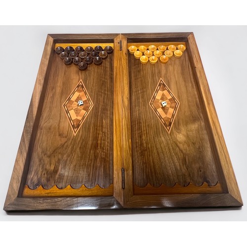 319 - Two various hand-made Chess/Draughts boards, each made from various burr-woods and hinged to provide... 