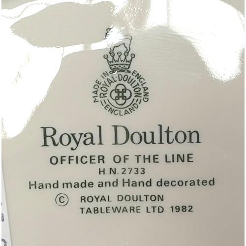 13 - Three Royal Doulton figures comprising, Officer Of The Line ‘HN 2733’, The Foaming Quart ‘HN 2162’ a... 