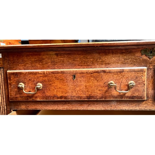 537 - An 18th century oak Mule Chest, the hinged top enclosing a shallow compartment, the front with a pai... 