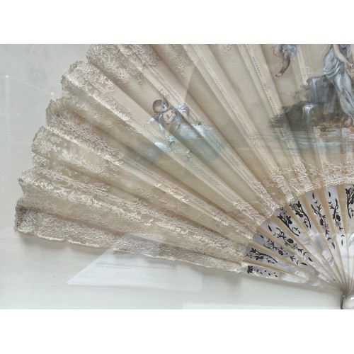 316 - A 19th century mother of pearl and lace fan by Duvelleroy (Jean-Pierre Duvelleroy) decorated with a ... 