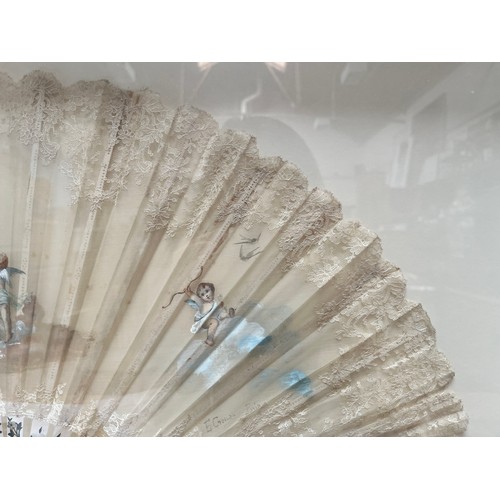 316 - A 19th century mother of pearl and lace fan by Duvelleroy (Jean-Pierre Duvelleroy) decorated with a ... 