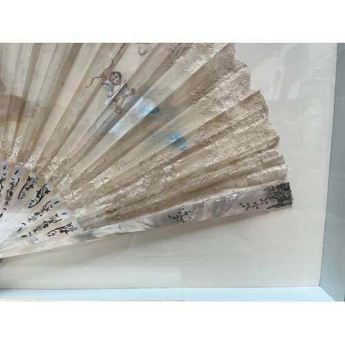 316 - A 19th century mother of pearl and lace fan by Duvelleroy (Jean-Pierre Duvelleroy) decorated with a ... 