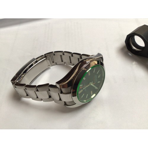 112 - A gents stainless steel Rolex Milgauss model 116400GV/72400 C.2014, the green dial with applied bato... 