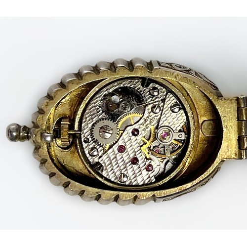 126 - A late 20th century silver gilt 'form watch’ by The St James's House Company, a reproduction of the ... 