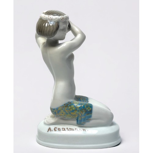 7 - A Rosenthal porcelain kneeling figure of “Ariadne” by Ariane Caasmann, in rarer colourway, 15cm high