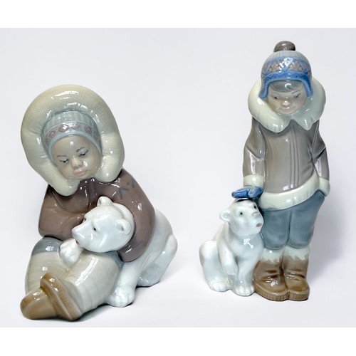 16 - Two Lladro matt and glazed figures of Chinese sages, one standing, the other seated, and two Lladro ... 