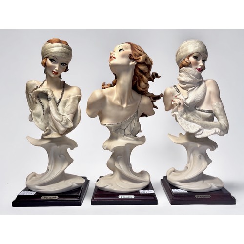 11 - Three various Capodimonte busts modelled as Art Deco style ladies, hand-painted moulded compositon, ... 