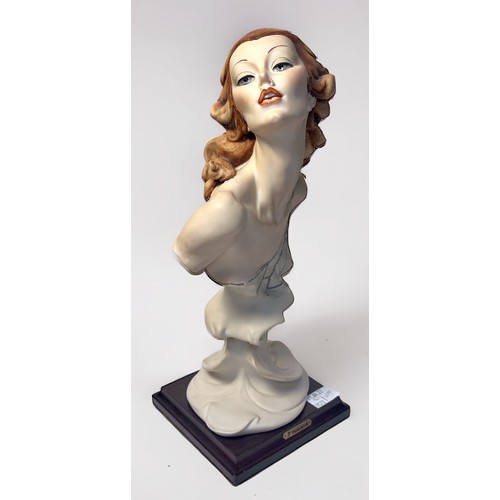 11 - Three various Capodimonte busts modelled as Art Deco style ladies, hand-painted moulded compositon, ... 