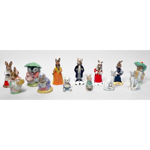 18 - Five Royal Doulton Bunnykins figures, four Beatrix Potter figures and a pair of seated Cheetah's by ... 