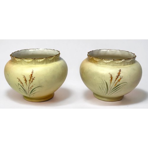 38 - A pair of late 19th/early 20th century porcelain small jardinieres by Locke Ltd, Worcester, painted ... 