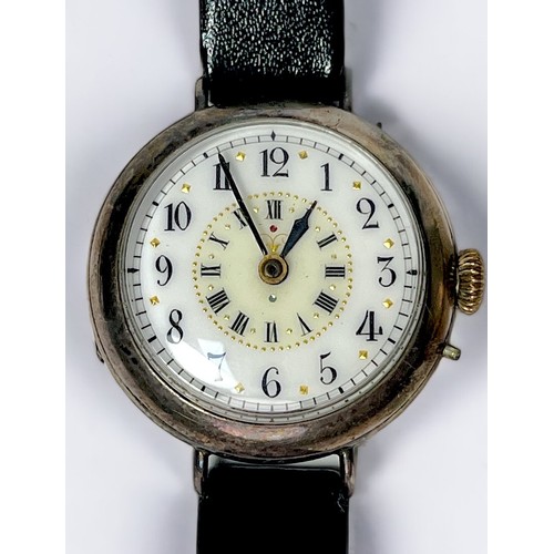 140 - A silver cased open-face pocket watch, the white enamel dial with Roman numerals denoting hours and ... 