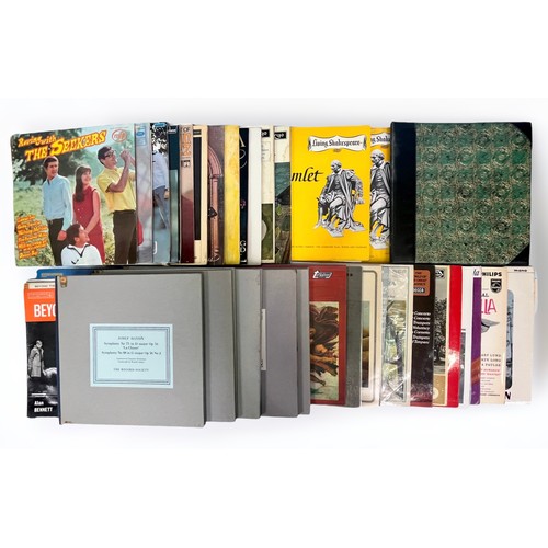 371 - A collection of approximately 70 assorted 12” and 10” vinyl records or varying genres and subject, a... 