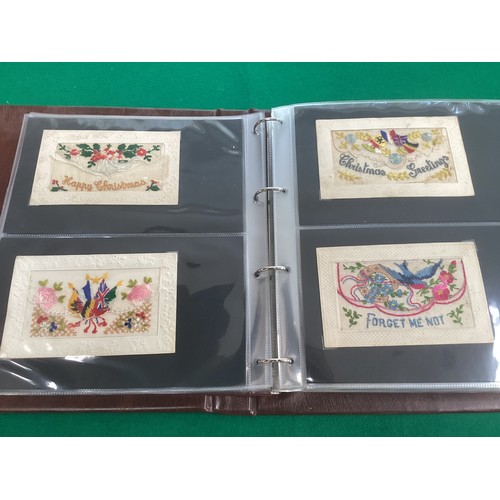 278 - A silk handkerchief with lace of the South Wales Borderers (1st photo) in an album containing 96 Wor... 