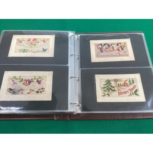 278 - A silk handkerchief with lace of the South Wales Borderers (1st photo) in an album containing 96 Wor... 